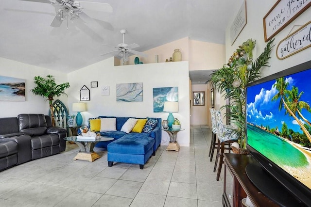 tiled living room with lofted ceiling and ceiling fan