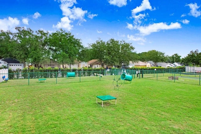 view of community featuring a yard