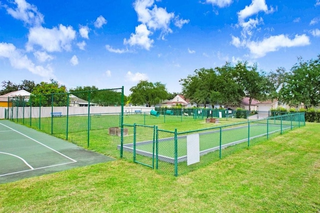 view of property's community with a lawn