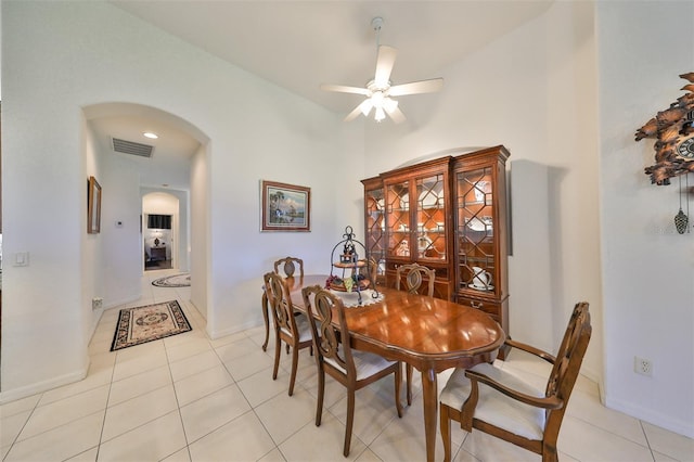 tiled dining room with ceiling fan