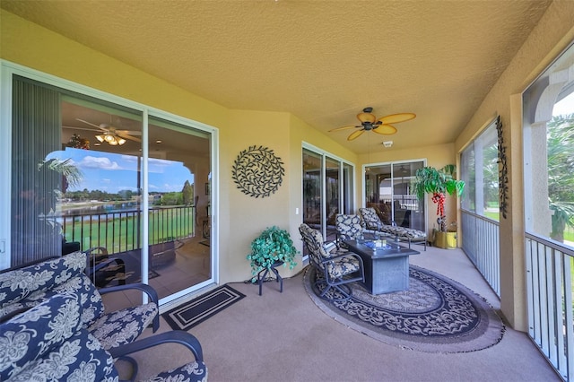 view of patio with ceiling fan