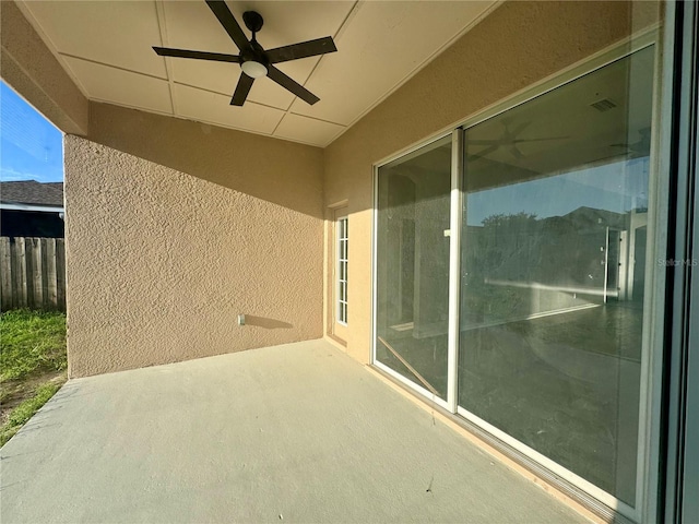 view of patio featuring fence