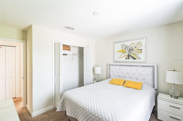 carpeted bedroom featuring a closet