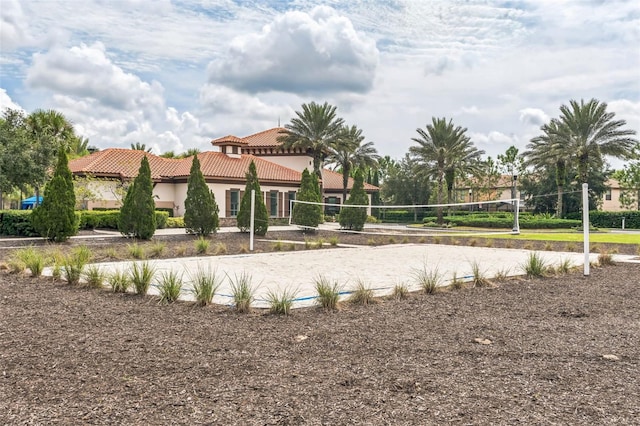 view of property's community featuring volleyball court