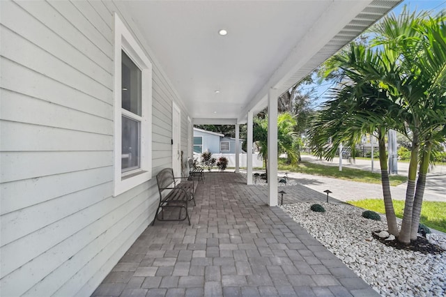 view of patio featuring a porch