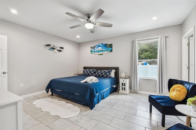 bedroom featuring light tile patterned flooring and ceiling fan