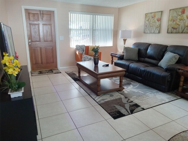 living room featuring light tile patterned floors