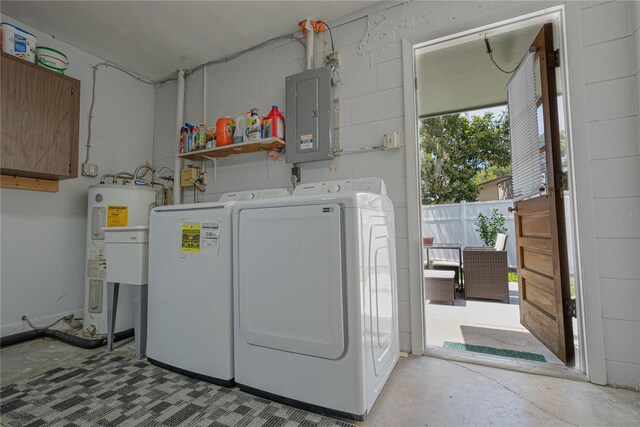 laundry area featuring independent washer and dryer, electric panel, and water heater