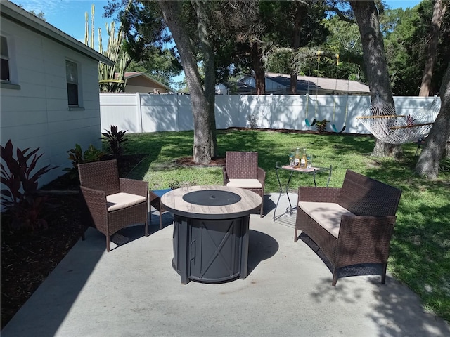 view of patio featuring a fire pit