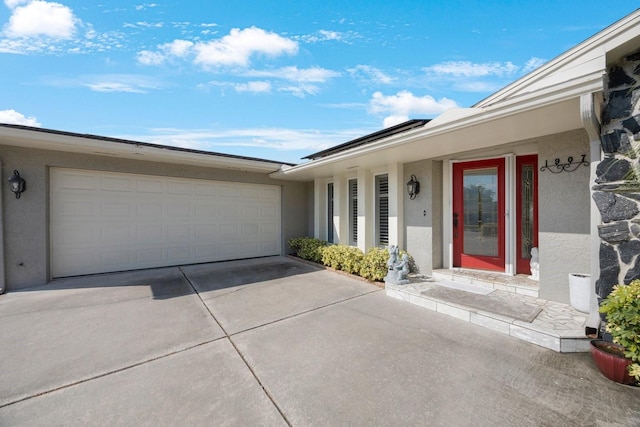 property entrance featuring a garage