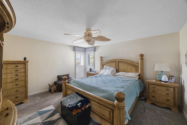 bedroom featuring ceiling fan, carpet, and a textured ceiling