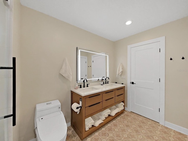 bathroom with vanity and toilet