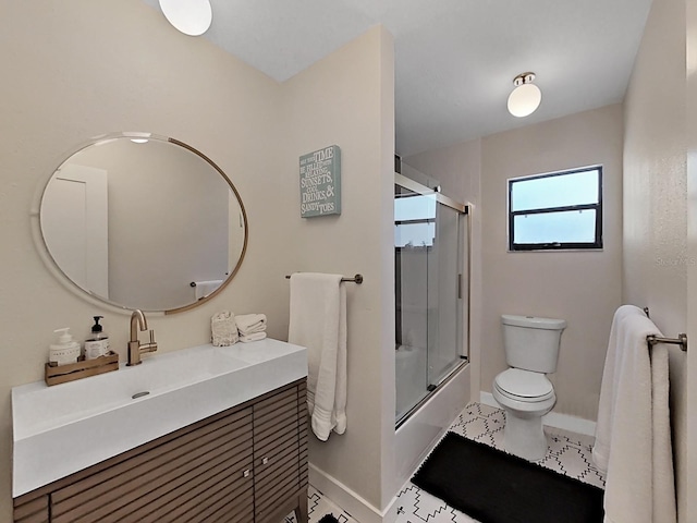 full bathroom featuring bath / shower combo with glass door, vanity, and toilet