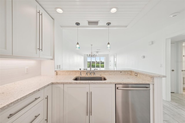 kitchen with dishwasher, light wood-type flooring, and white cabinetry