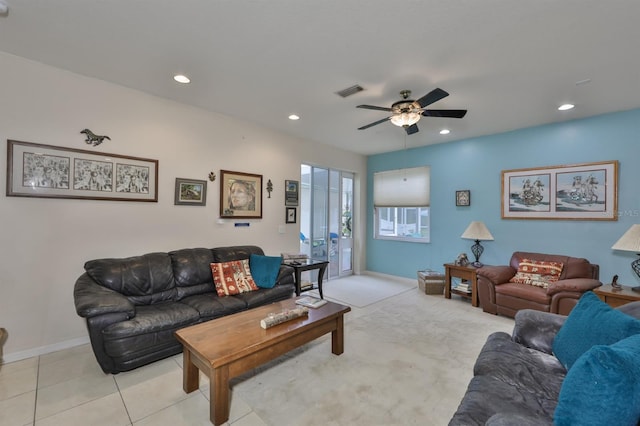 living room with light tile patterned floors and ceiling fan