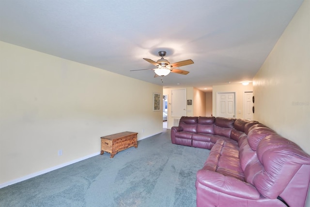 living room with carpet floors and ceiling fan