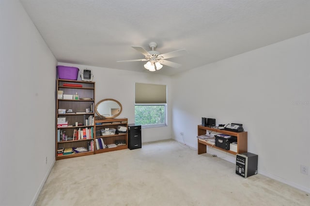 miscellaneous room with ceiling fan and carpet floors