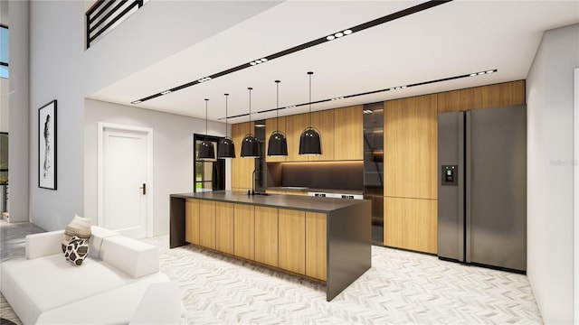 kitchen with pendant lighting and light colored carpet