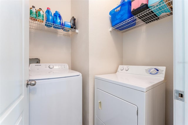 laundry room featuring independent washer and dryer