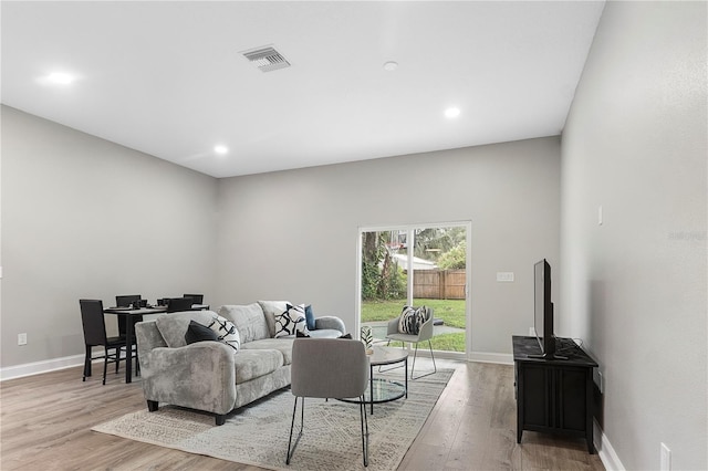 living room with light hardwood / wood-style floors