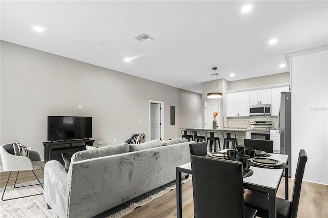 dining area featuring light hardwood / wood-style flooring