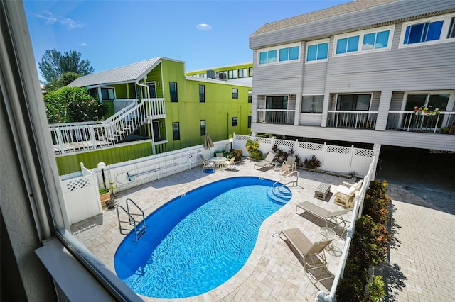 view of pool with a patio area