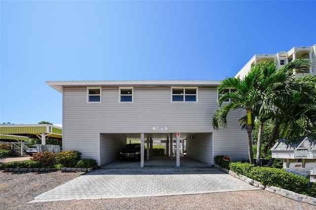 exterior space featuring a carport