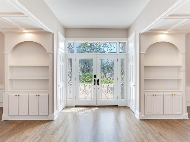 entrance foyer featuring french doors, light hardwood / wood-style flooring, and coffered ceiling