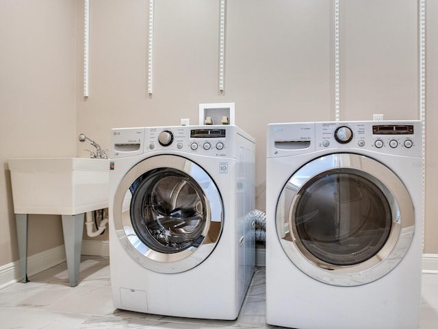 laundry area featuring independent washer and dryer