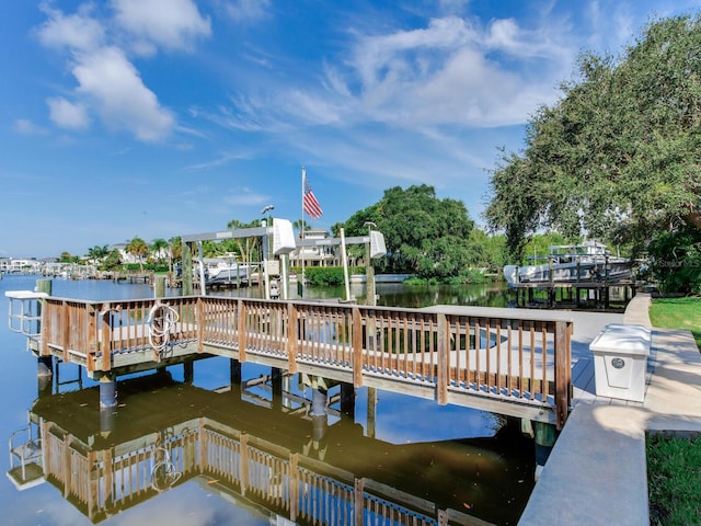 2509 N Dundee St, Tampa, FL 33629 - dock featuring boat lift and a water view