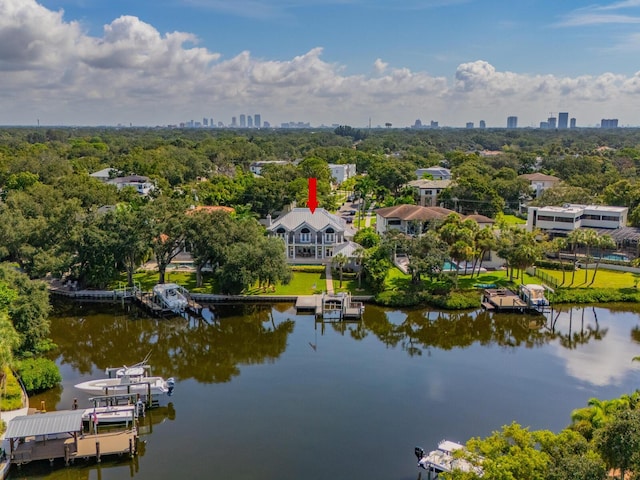 birds eye view of property featuring a water view