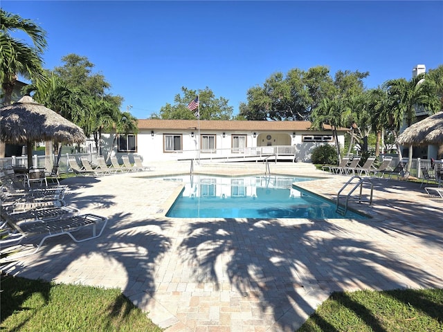 view of pool featuring a patio