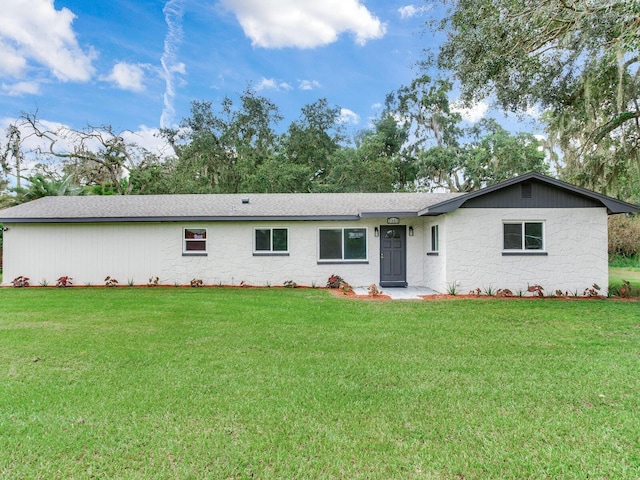 view of front of home with a front yard