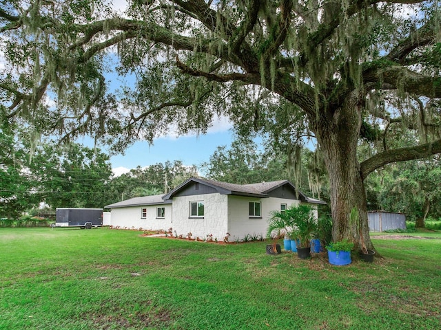 exterior space featuring a lawn