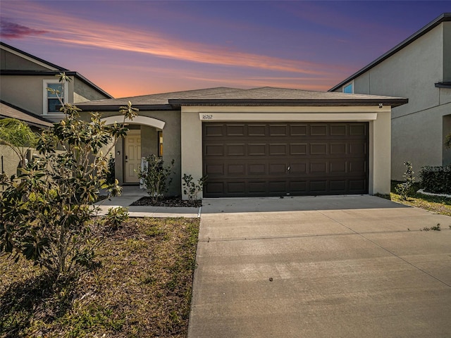 view of front of home featuring a garage