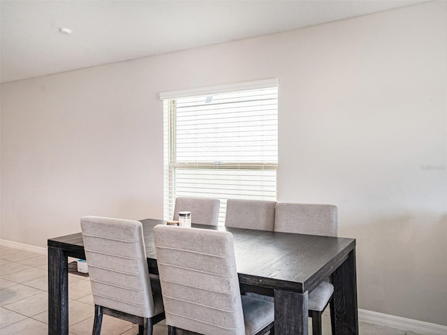 dining room featuring light tile patterned flooring