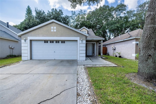 single story home with a garage and a front yard