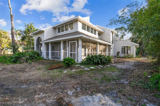 exterior space featuring a sunroom