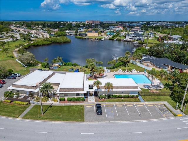 birds eye view of property featuring a water view