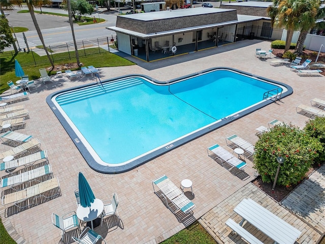 view of swimming pool featuring a patio