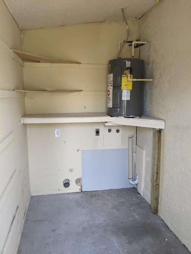 utility room featuring electric water heater