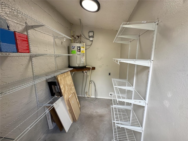 storage area featuring electric water heater