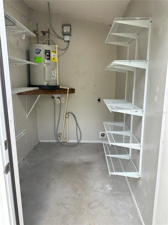 spacious closet featuring electric water heater