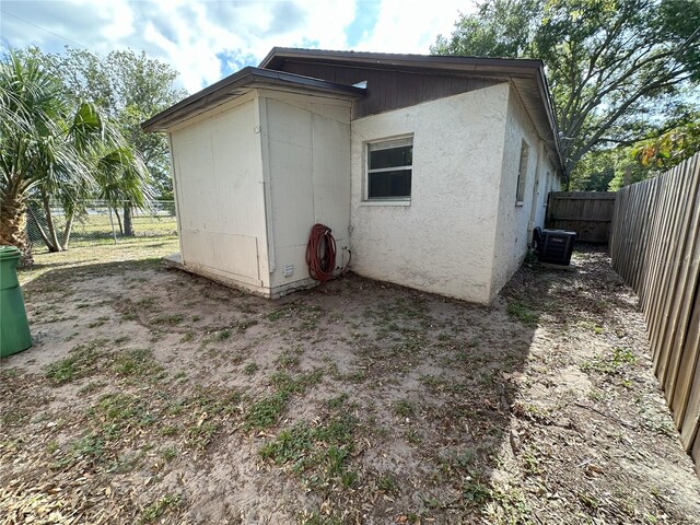 exterior space with central air condition unit