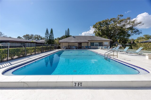 view of pool featuring a patio