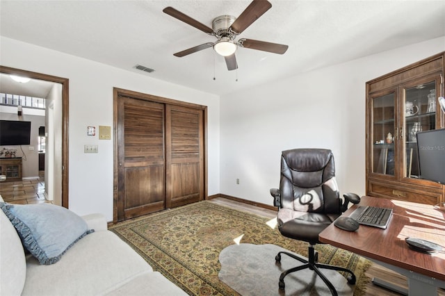 home office featuring ceiling fan