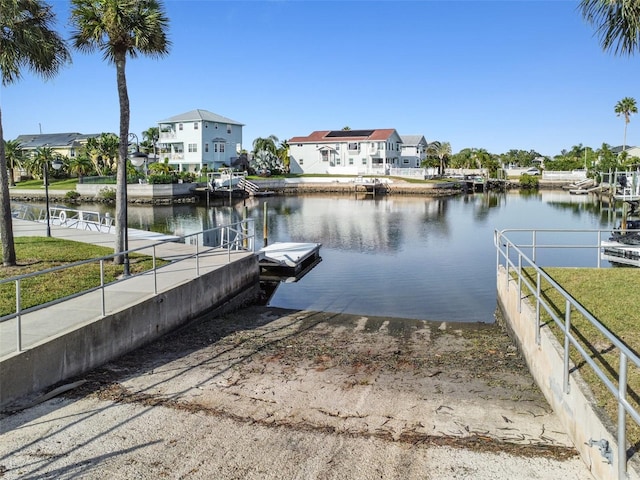 dock area with a water view