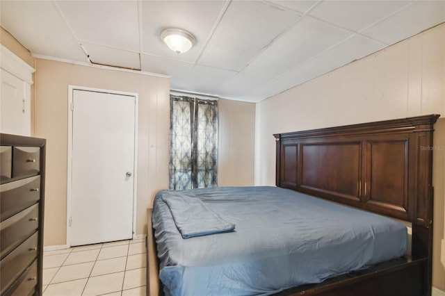 bedroom with light tile patterned floors