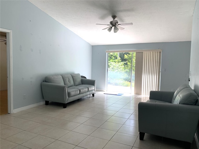 tiled living room featuring vaulted ceiling and ceiling fan