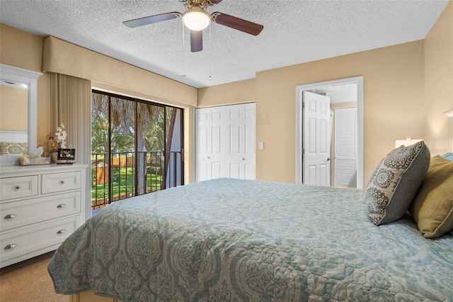 carpeted bedroom featuring ceiling fan, a textured ceiling, and access to exterior